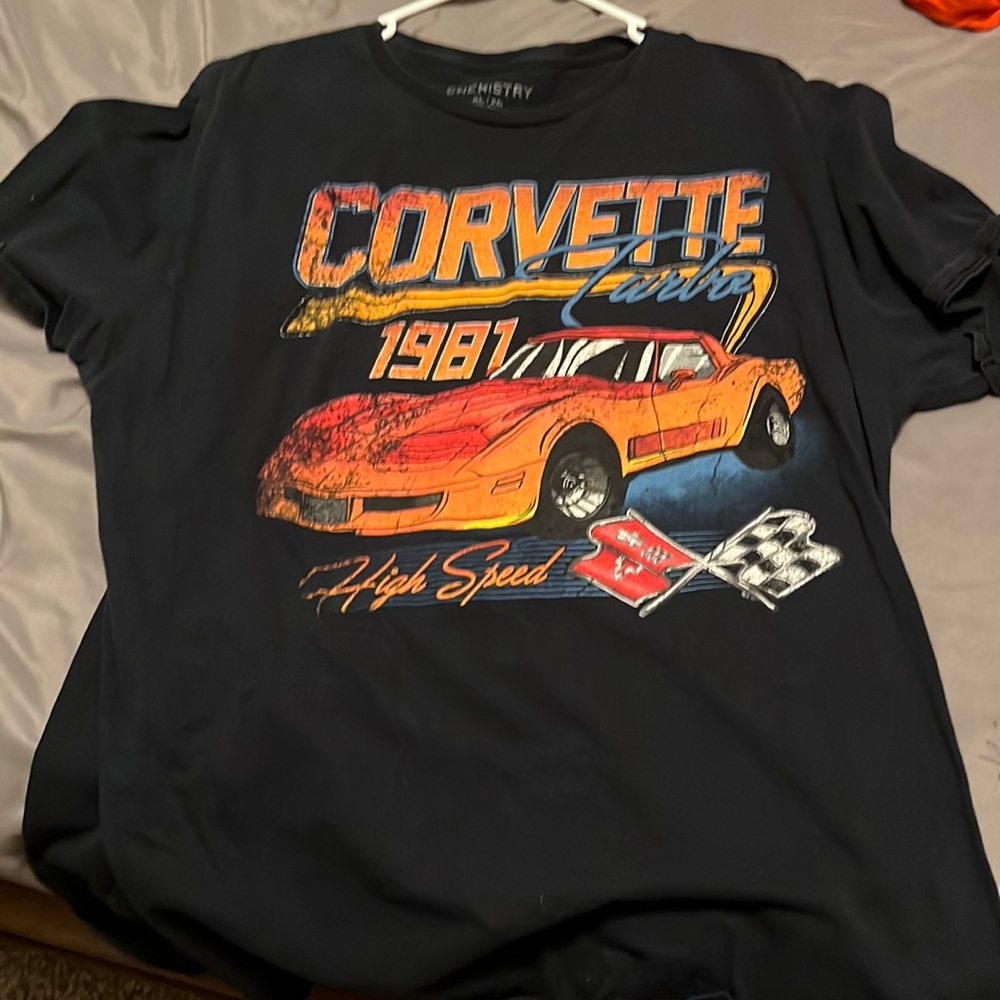 Fits like an XL. Great for a oversized graphic, but don’t wear much anymore.